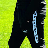 Bas d'entraînement Aways Performer noir porté - détail poche zippée et logo