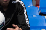 Haut d’entraînement Aways Performer noir – détails logo zip et bande manches