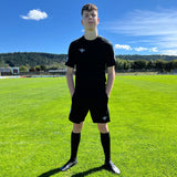 Short d'entraînement Aways Performer noir porté - sur terrain de football